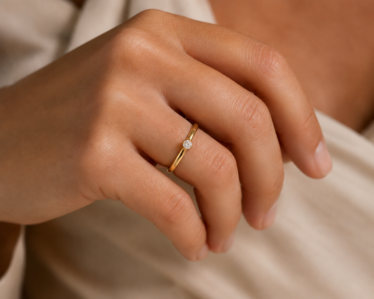 Solenne natural diamond ring worn on finger
