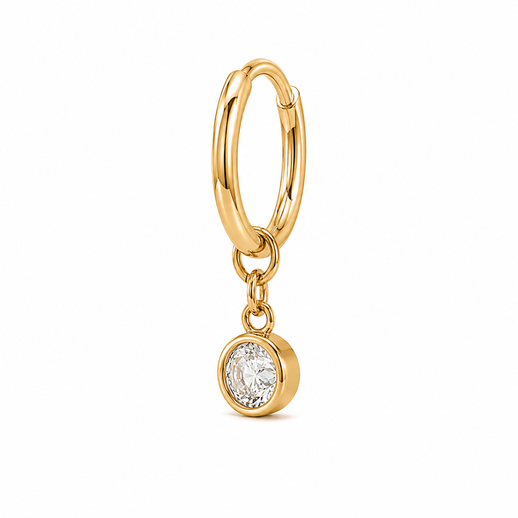 Side view of Lueur diamond drop hoop earring in 18K yellow gold
