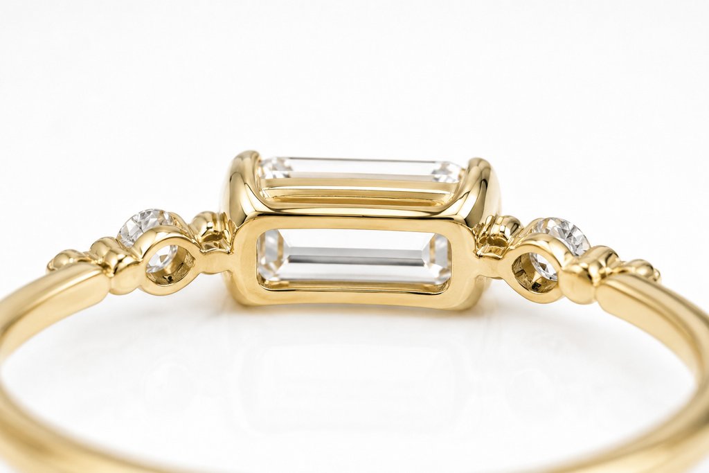 Detail of Aureline emerald-cut diamond ring setting and under-gallery

