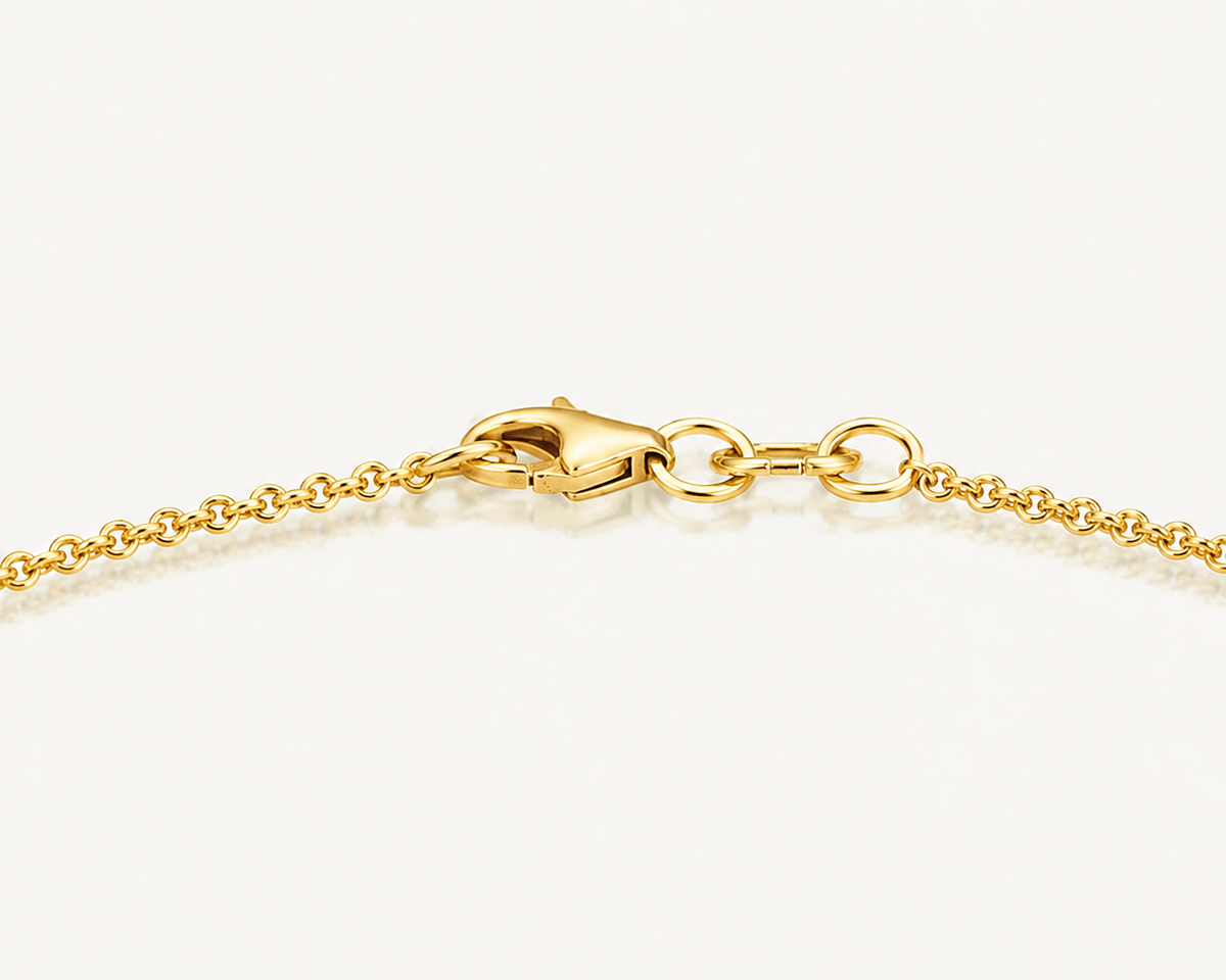 Close-up of Asscher-cut lab-grown diamond on Linéa 14K yellow gold bracelet

