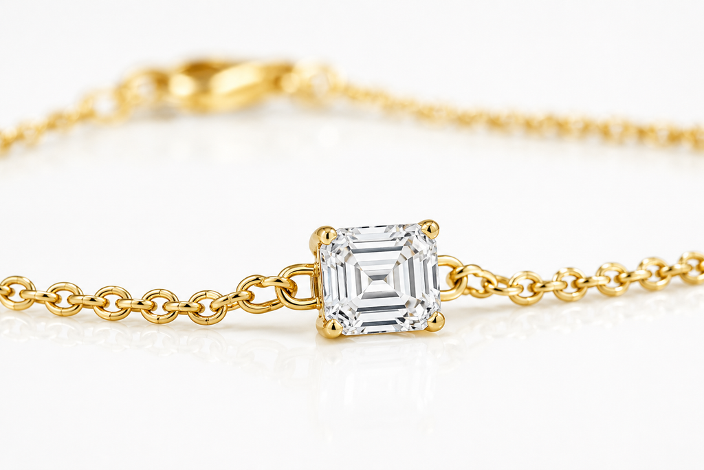 Close-up of Asscher-cut lab-grown diamond on Linéa 14K yellow gold bracelet
