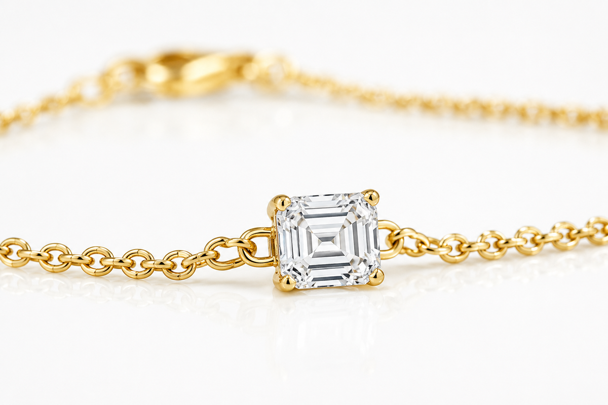 Close-up of Asscher-cut lab-grown diamond on Linéa 14K yellow gold bracelet
